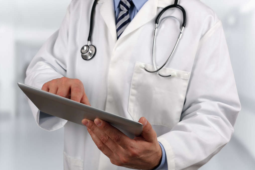 doctor using medical tablet