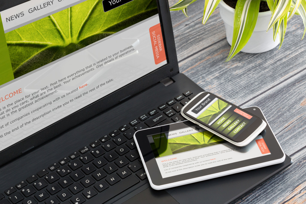 website design shown on mobile phone, laptop, and tablet